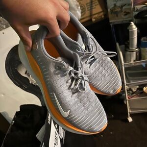 Nike Gray and Orange Athletic Shoes with Knit Upper
